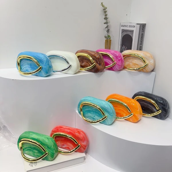 Modern Metallic Oval Handle Clutch